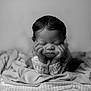 Syncerely is registered to the contest to win money with this photo: baby, newborn, infant, black_and_white, sleeping, hands, face, blanket, soft, closeup, portrait, cute, peaceful, resting, young_child, delicate, indoors, calm, tender, child