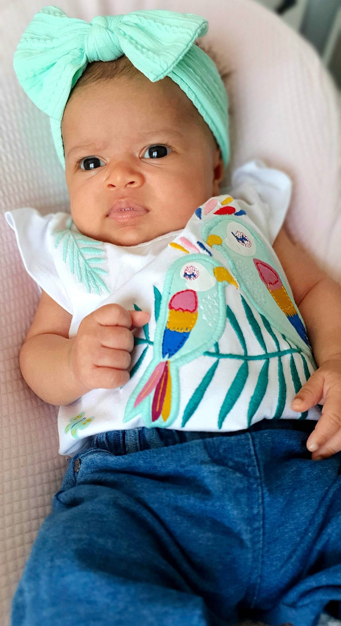 Maélie participe au concours pour gagner de l'argent avec cette photo : baby, baby_products, baby_toddler_clothing, cheek, child, eye, face, head, headgear, person, product, sitting, skin, toddler