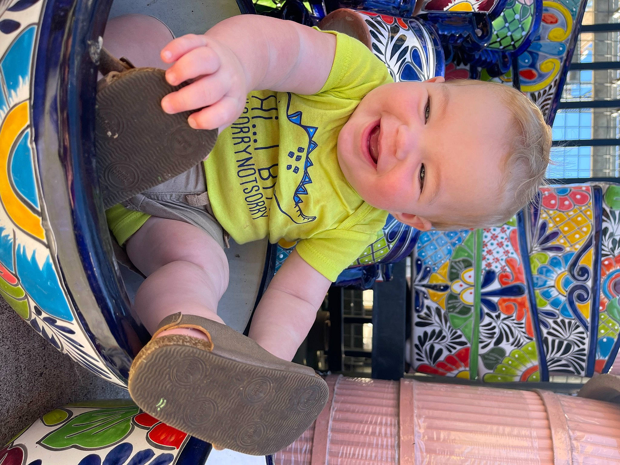 Kaison is registered to the contest to win money with this photo: auto_part, automotive_tire, automotive_wheel_system, baby, baby_products, baby_toddler_clothing, child, fun, grass, happy, leisure, person, personal_protective_equipment, play, recreation, smile, sports_gear, t_shirt, tire, toddler