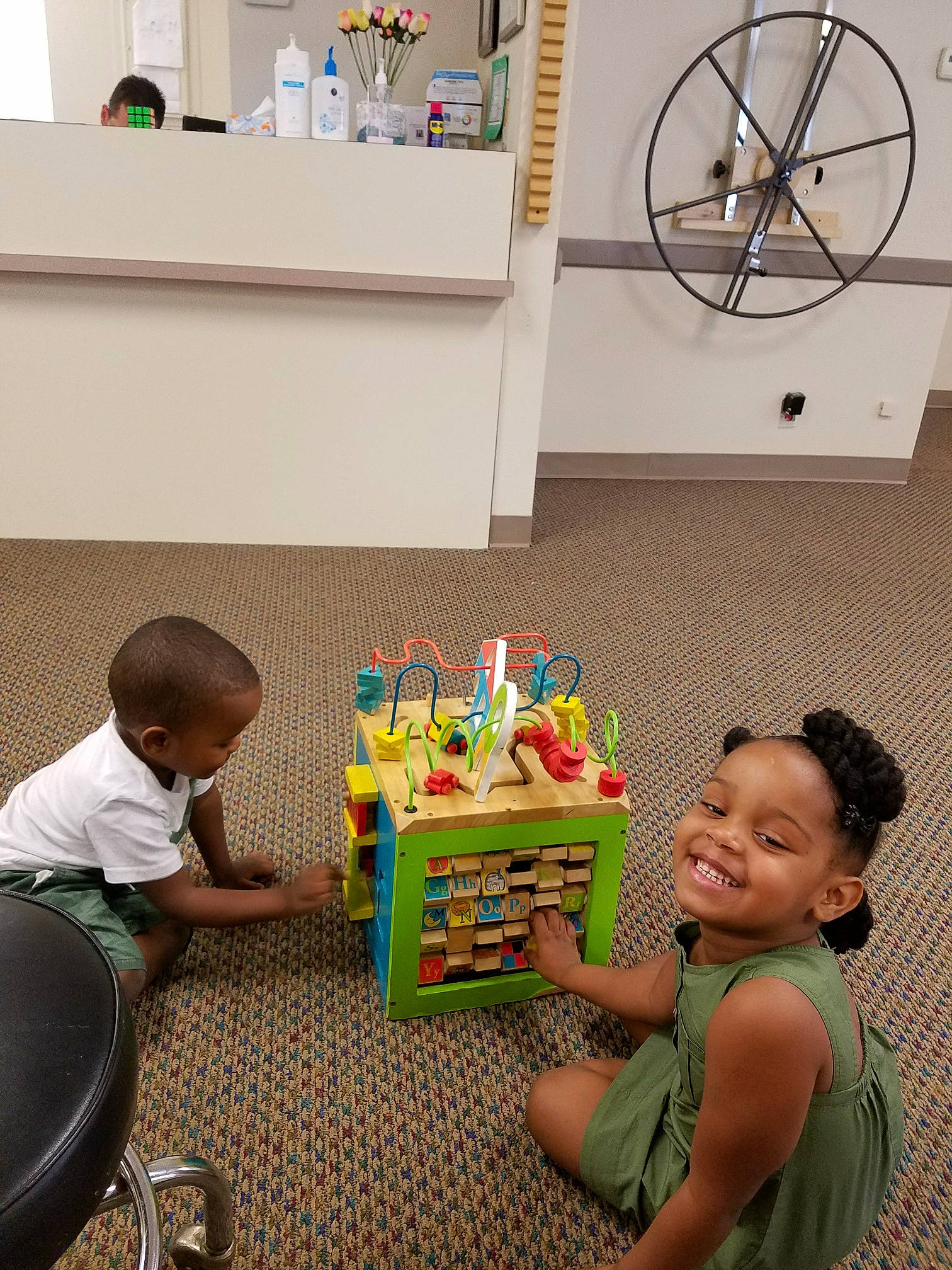 Noelle is registered to the contest to win money with this photo: arm, child, community, flooring, fun, hand, interior_design, joy, leisure, organ, people, person, photograph, product, sharing, smile, snapshot, standing, t_shirt, toddler