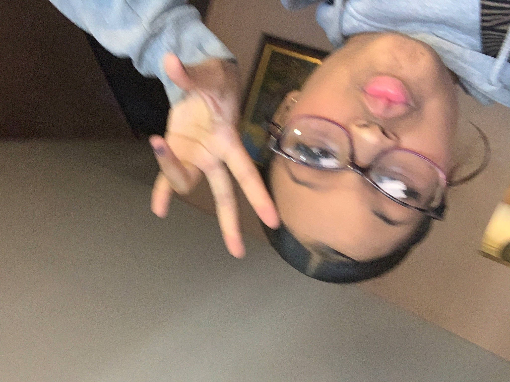 Nevaeh is registered to the contest to win money with this photo: cheek, ear, elbow, eyelash, eyewear, finger, fun, gesture, glasses, hand, happy, jaw, mouth, nail, nose, person, sign_language, smile, thumb, vision_care