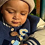 Noah Daniel participe au concours pour gagner de l'argent avec cette photo : blue_patch, child, closeup, cute, daylight, face, hand, hat, jacket, knit_hat, letter_patch, looking_down, navy_jacket, outdoor, person, skin, sunlight, toddler, warm_clothing, young_child