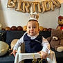 Damian participe au concours pour gagner de l'argent avec cette photo : baby, balloons, birthday, celebration, child, crown, decorations, festive, gold_balloons, happy, high_chair, indoor, one_year_old, party, person, smile, sofa, teddy_bear, vest, white_shirt