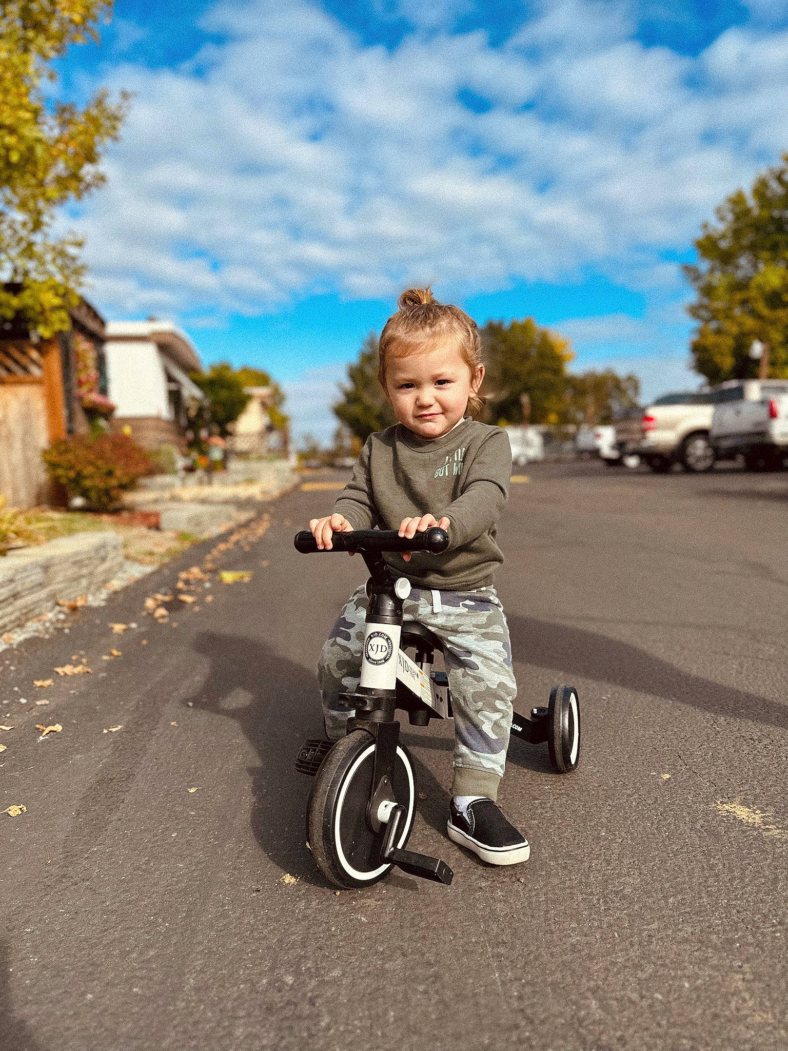 Alex joined the competition — help win amazing prizes! asphalt, automotive_tire, automotive_wheel_system, bicycle, bicycle_tire, bicycle_wheel, city, cloud, joy, motor_vehicle, person, plant, recreation, rim, road, road_surface, rolling, sky, tire, toddler