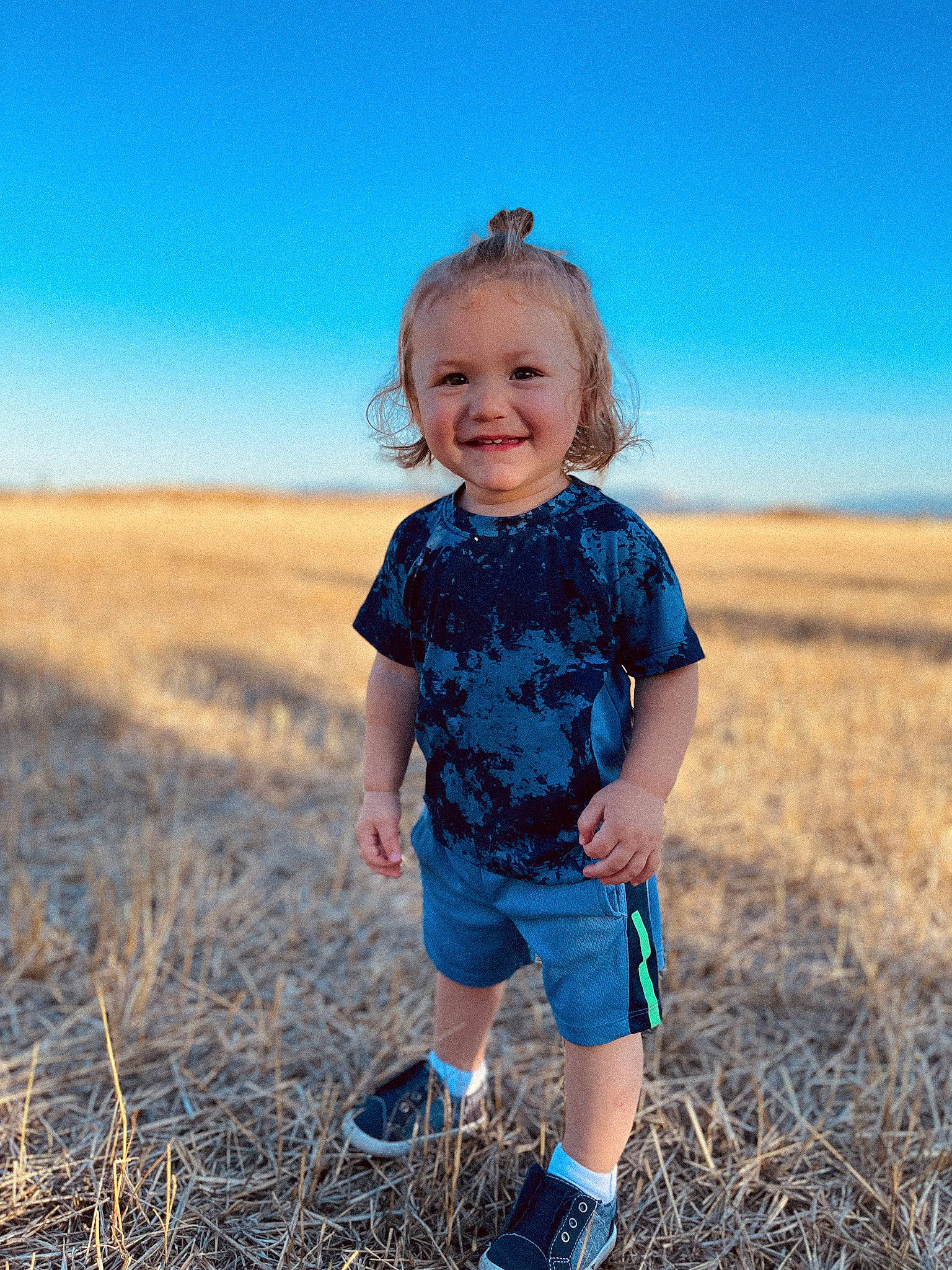 Alex joined the competition — help win amazing prizes! azure, baby_toddler_clothing, cloud, electric_blue, face, flash_photography, fun, grass, grassland, happy, head, iris, joy, landscape, meadow, people_in_nature, person, prairie, sky, smile