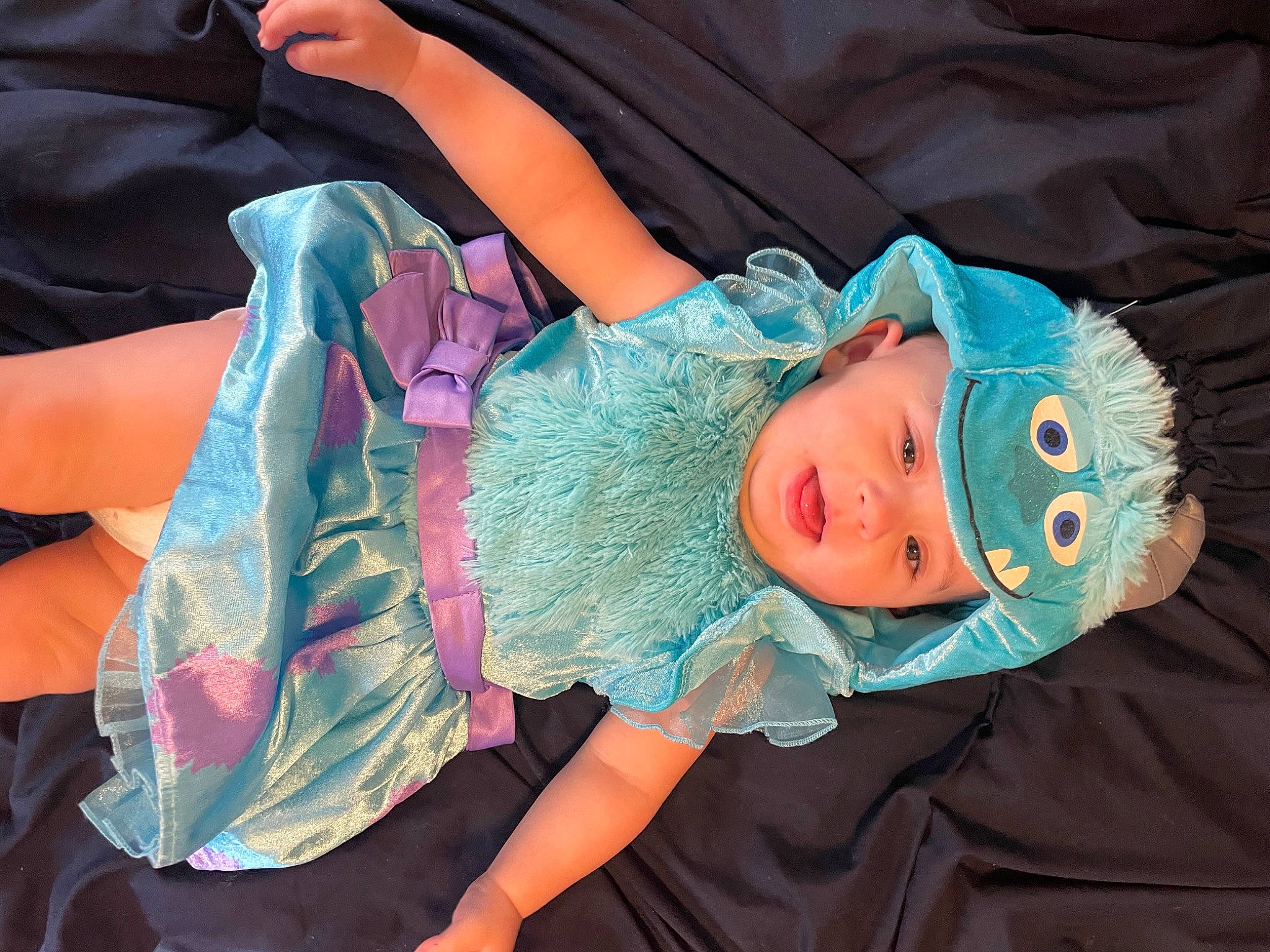 Jacquelyn joined the competition — help win amazing prizes! baby, baby_products, baby_toddler_clothing, child, costume, dress, embellishment, fashion_design, fun, headwear, human_body, magenta, pattern, person, pink, ruffle, sleeve, textile, thigh, toddler