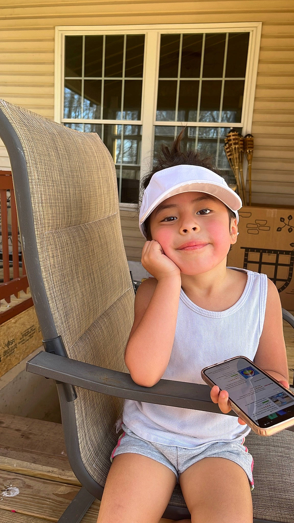 Kamila is registered to the contest to win money with this photo: cap, child, comfort, eyewear, fun, happy, headgear, headwear, human_body, human_leg, joint, joy, knee, leg, leisure, person, shorts, sitting, thigh, toddler