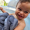 Amari is registered to the contest to win money with this photo: toddler, child, smiling, face, towel, water, pool, outdoor, happy, skin, hair, person, summer, relaxing, sunlight, baby, expression, cute, closeup, nature