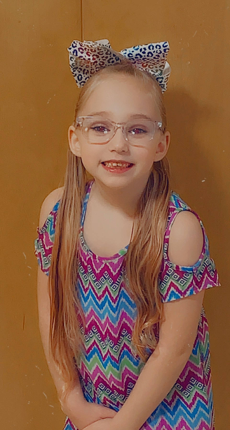 Ily is registered to the contest to win money with this photo: child, chin, clothing, costume_hat, electric_blue, eye, eyebrow, eyewear, face, fashion_design, hair, happy, head, headband, headpiece, jewellery, joy, lip, long_hair, person