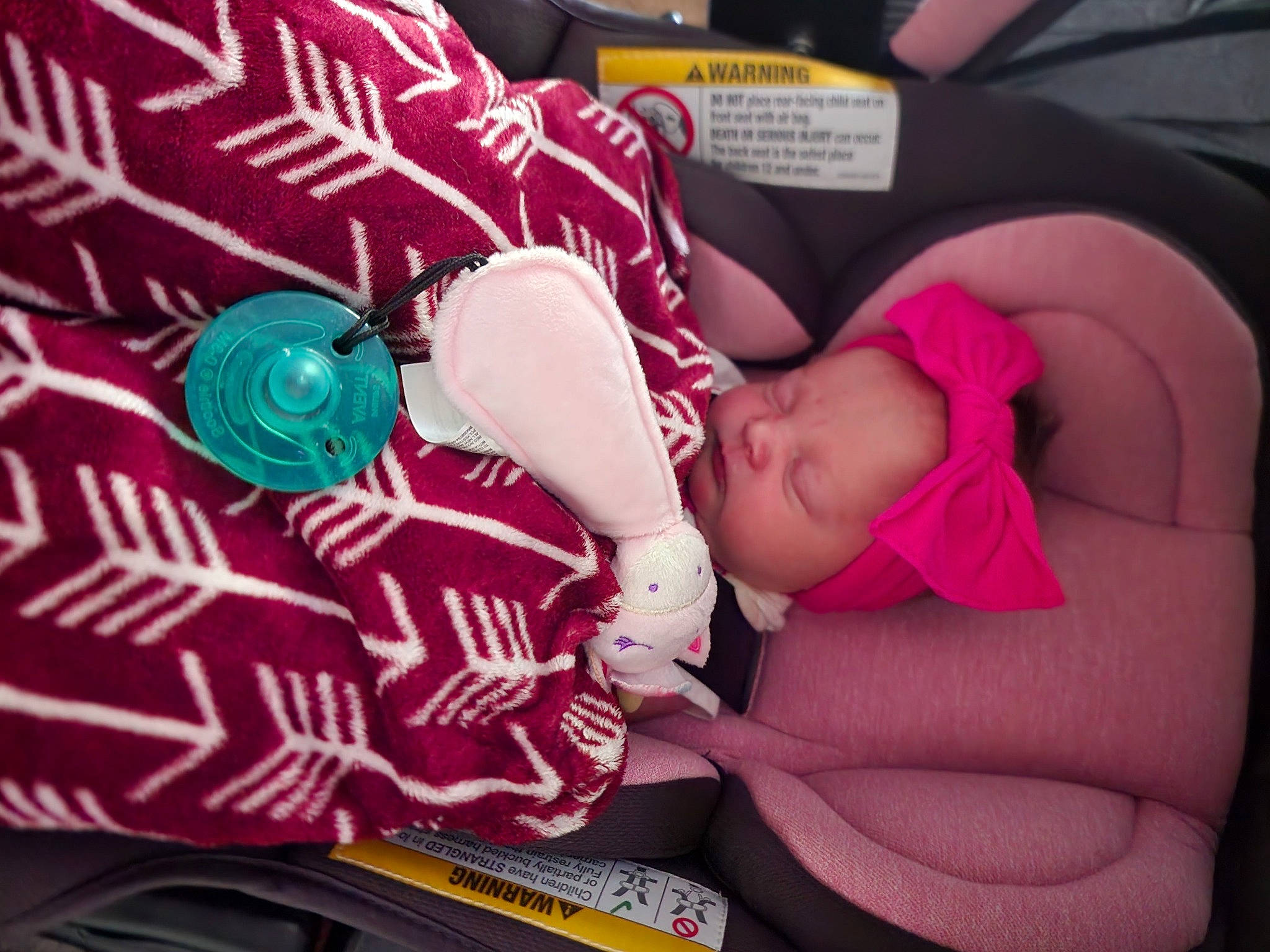 Azilynn is registered to the contest to win money with this photo: baby, baby_products, baby_toddler_clothing, beauty, child, comfort, event, finger, hat, human_body, lap, magenta, pattern, person, pink, product, sleeve, sock, textile, thigh