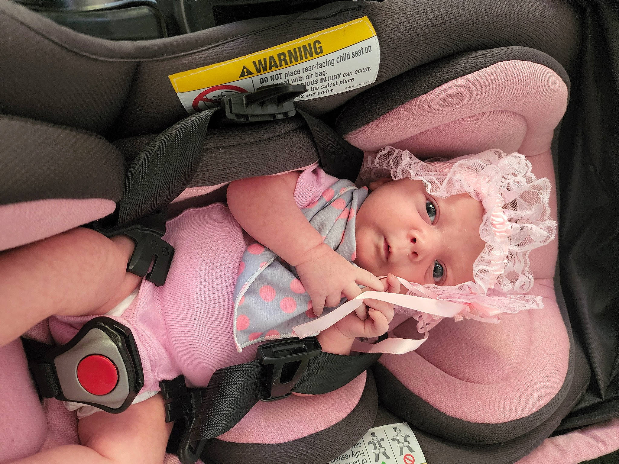 Azilynn joined the competition — help win amazing prizes! auto_part, baby, baby_carriage, baby_products, baby_toddler_clothing, car_seat, carmine, child, comfort, finger, headwear, lap, nail, pattern, person, pink, sitting, skin, thigh, thumb