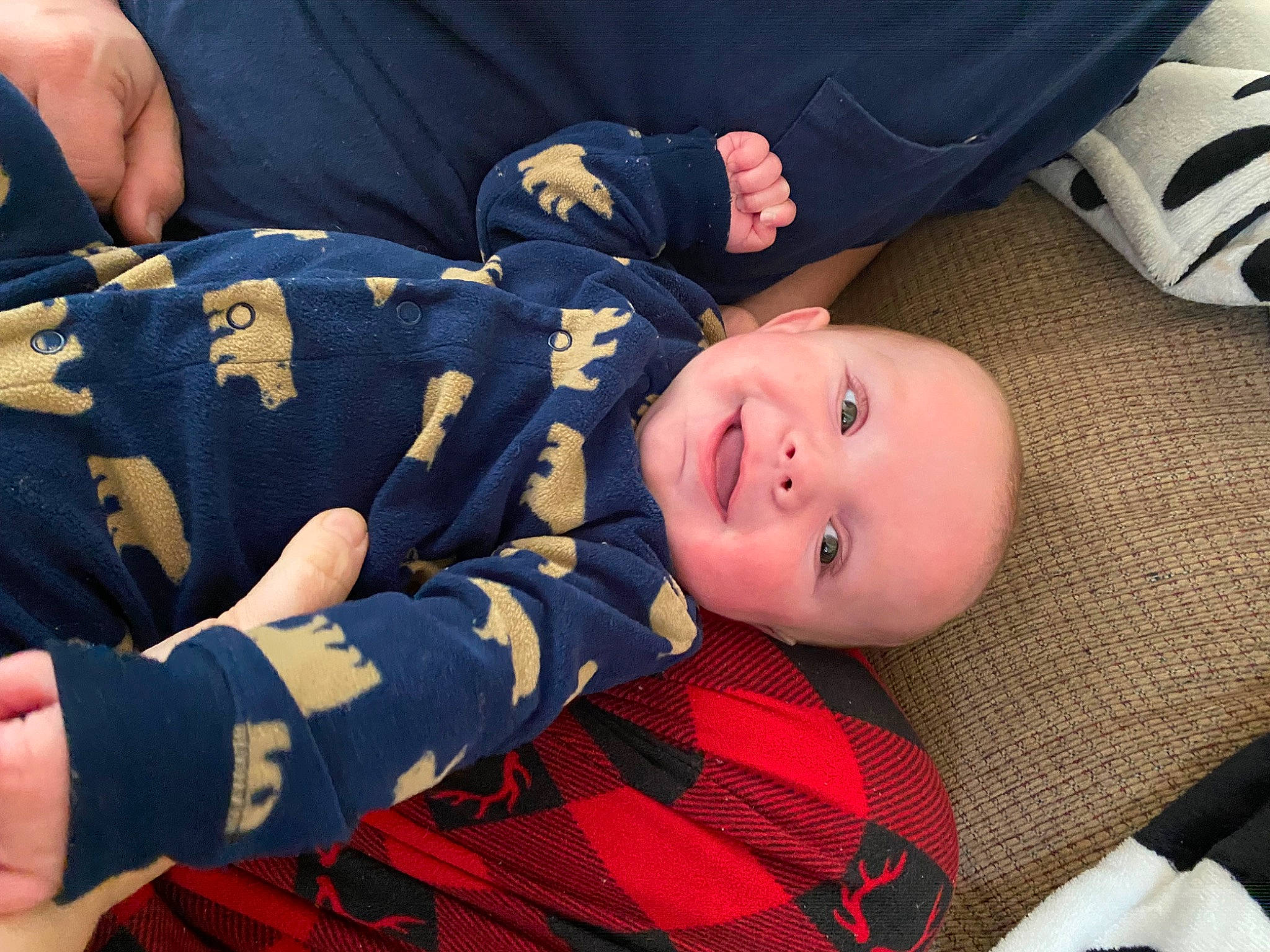 Avery is registered to the contest to win money with this photo: baby, baby_laughing, baby_toddler_clothing, child, comfort, elbow, finger, fun, gesture, happy, hat, joy, mammal, pattern, person, plaid, sitting, smile, tartan, thumb