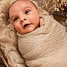 baby, newborn, wrapped, blanket, knit, cozy, infant, portrait, face, cute, soft, warm, texture, closeup, child, sleeping_bag, indoors, person, adorable, resting