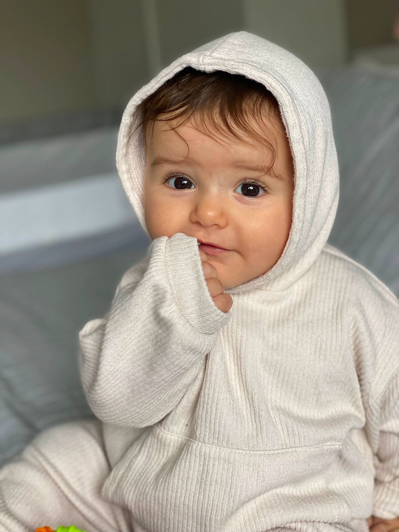 Mikael is registered to the contest to win money with this photo: baby, baby_toddler_clothing, cheek, chin, comfort, eye, eyebrow, face, facial_expression, head, headgear, headwear, lip, nose, outerwear, person, product, skin, sleeve, smile