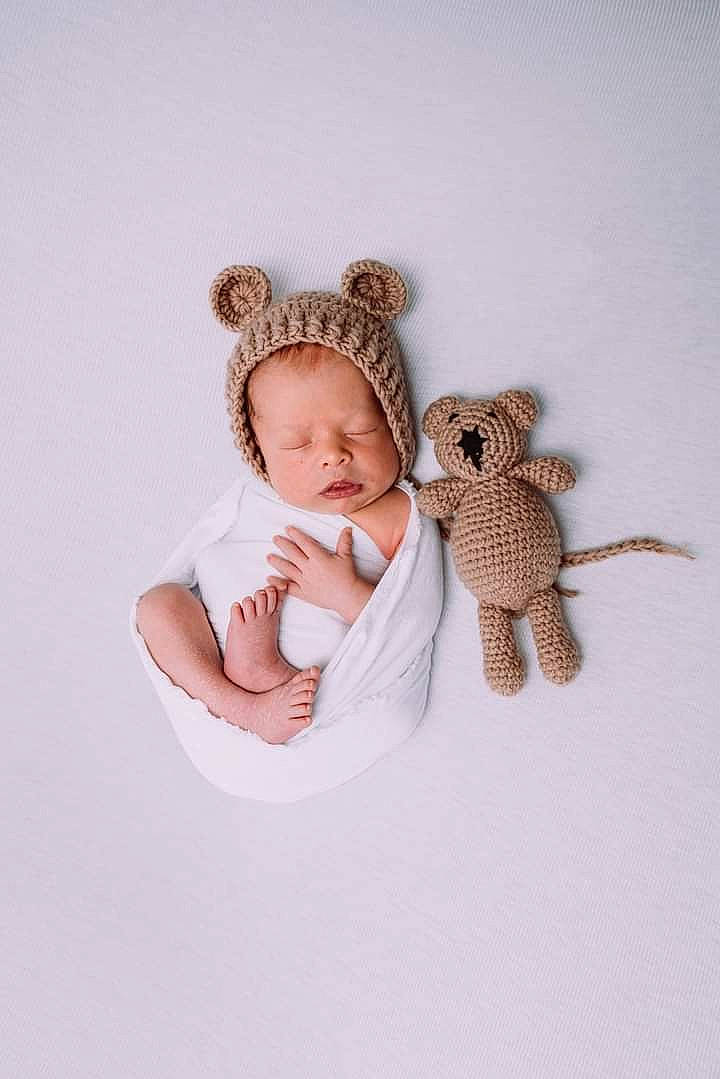 Malakai joined the competition — help win amazing prizes! art, baby, baby_sleeping, baby_toddler_clothing, child, comfort, craft, fashion_accessory, foot, hair_accessory, headband, headpiece, jewellery, linens, pattern, person, sitting, sleeve, toddler, toy