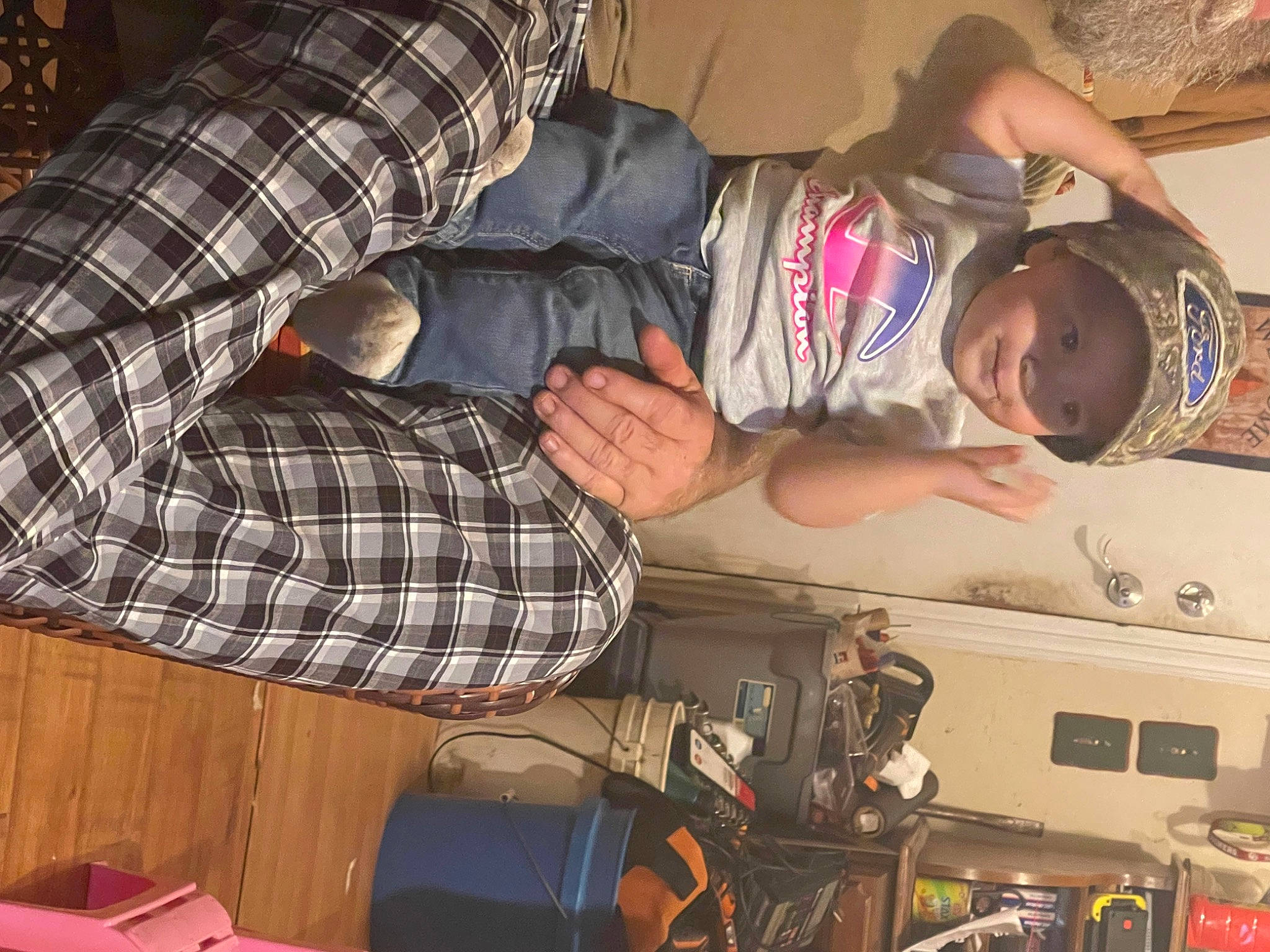 Kinsley is registered to the contest to win money with this photo: arm, audio_equipment, child, comfort, engineering, eyewear, fashion, finger, fun, hand, hat, headwear, luggage_and_bags, machine, mammal, office_equipment, pattern, person, plaid, room