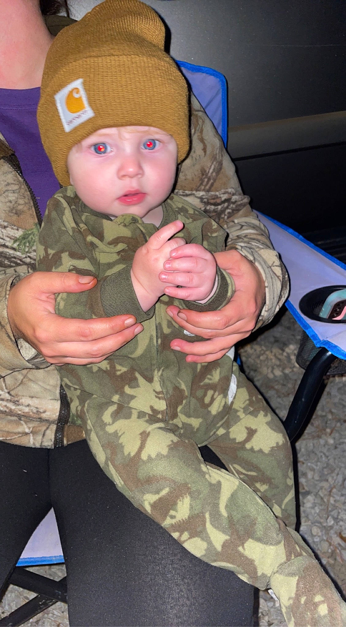 Asher is registered to the contest to win money with this photo: army, baby, baby_toddler_clothing, camouflage, cap, eye, finger, gesture, head, headwear, human_body, marines, military_camouflage, military_person, military_uniform, non_commissioned_officer, pattern, person, sleeve, soldier