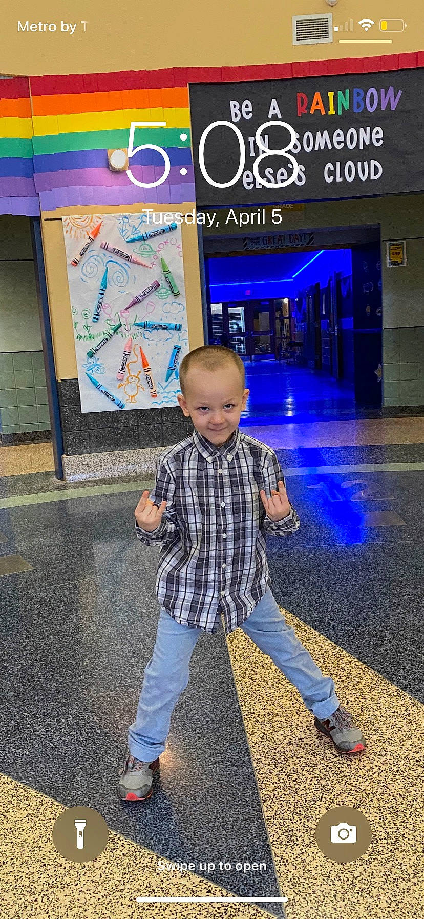 Bentley is registered to the contest to win money with this photo: asphalt, city, electric_blue, floor, flooring, footwear, fun, happy, joy, leisure, logo, pedestrian, person, plaid, public_space, recreation, road_surface, sidewalk, smile, standing