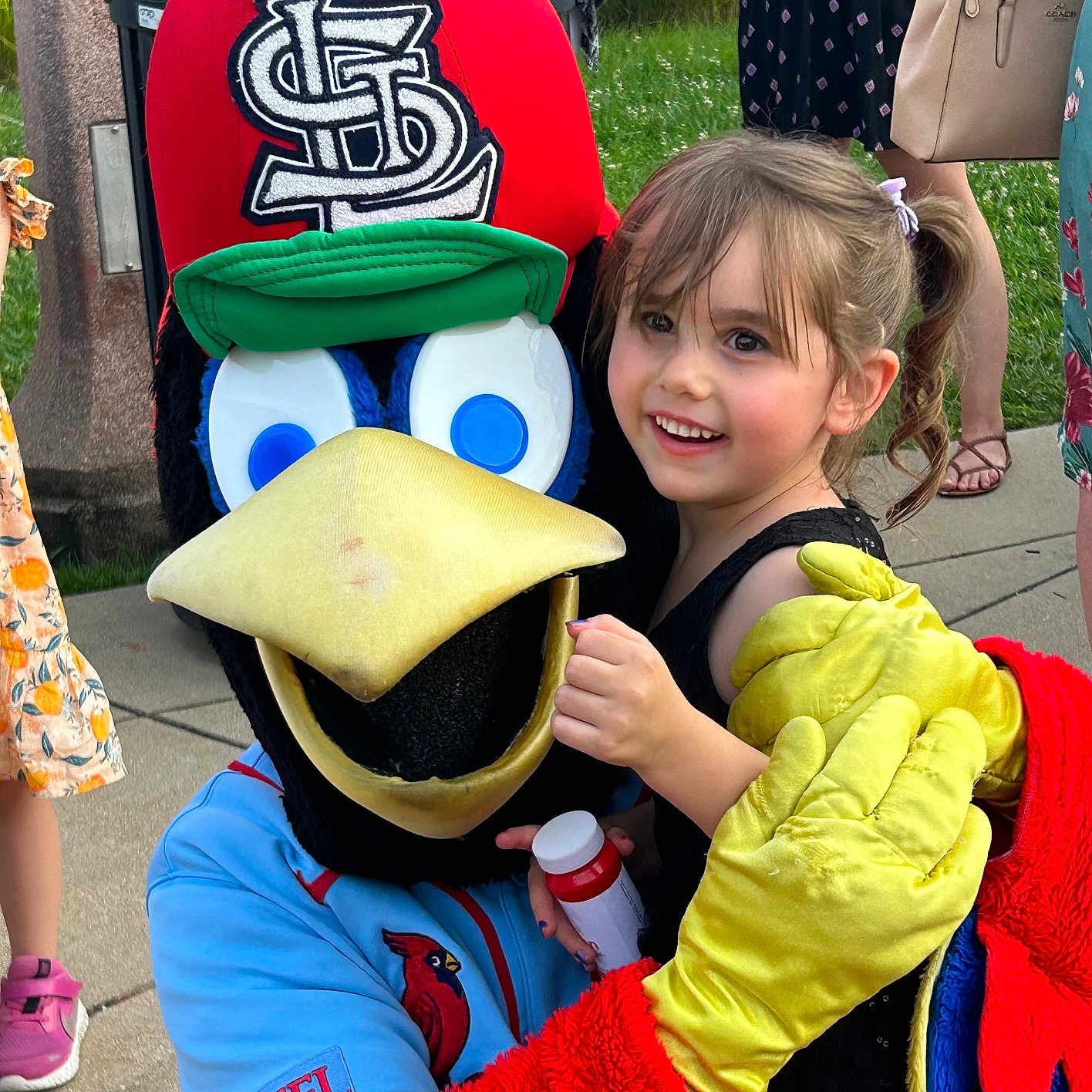 Madison is registered to the contest to win money with this photo: accessories, bag, ball, child, clothing, coat, costume, face, football, footwear, glove, handbag, head, person, photography, portrait, shoe, soccer, soccerball, sport