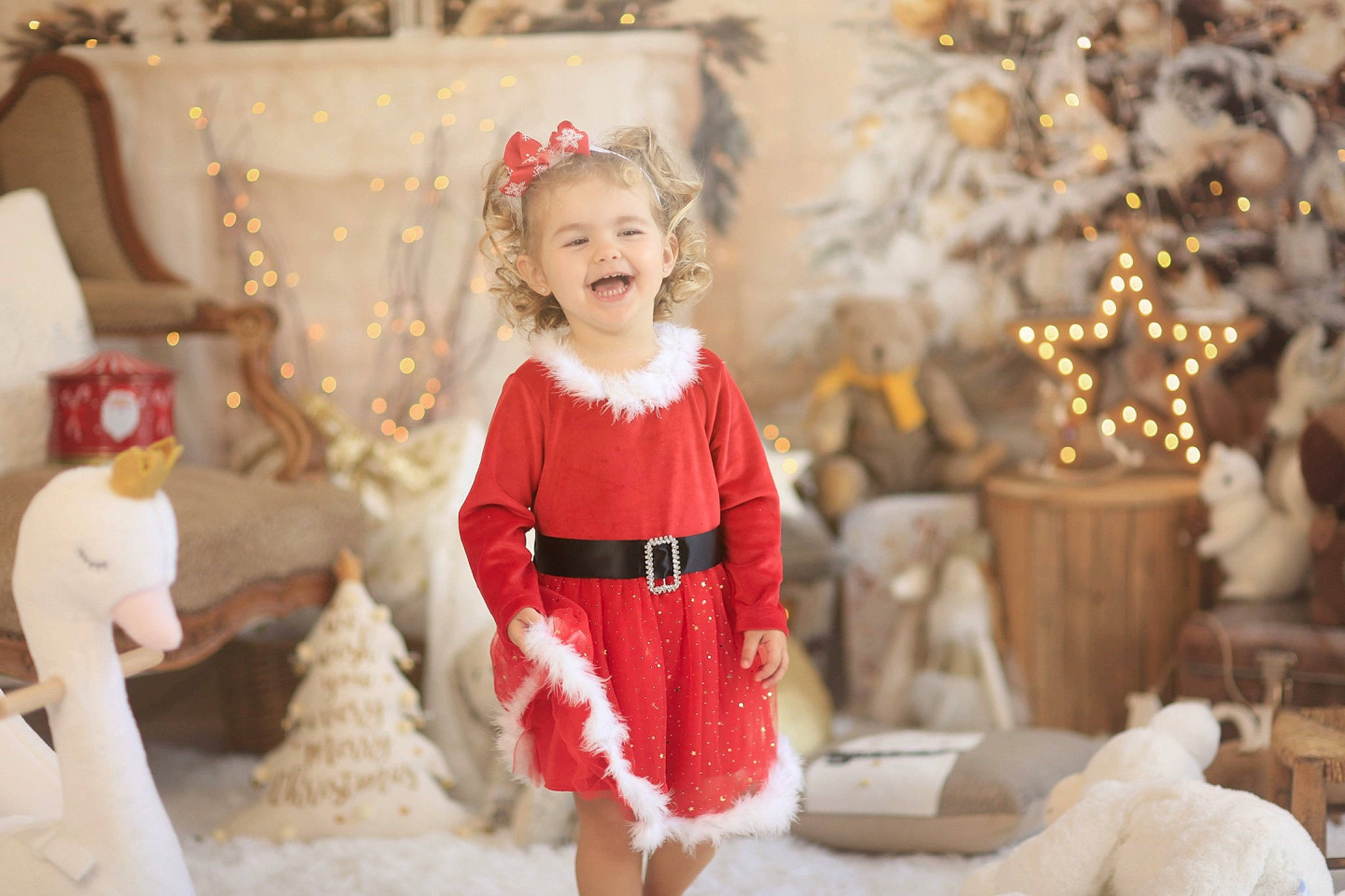Cataleya participe au concours pour gagner de l'argent avec cette photo : baby_toddler_clothing, child, christmas, christmas_decoration, christmas_ornament, christmas_tree, dress, embellishment, face, facial_expression, happy, head, human_body, joy, outerwear, person, sleeve, smile, standing, toddler