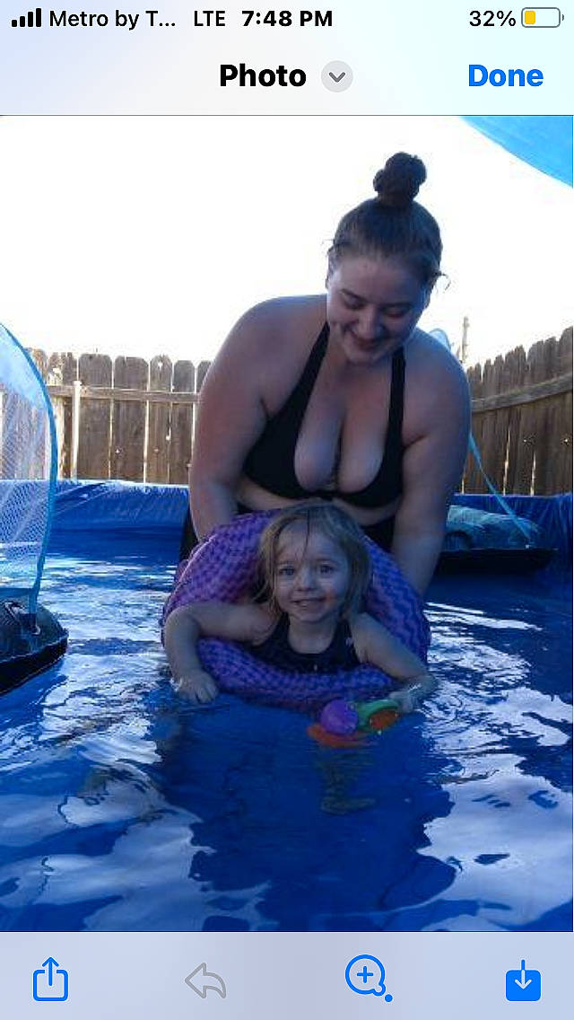 Haisley is registered to the contest to win money with this photo: bathing, blue, brassiere, chest, electric_blue, event, fun, happy, jewellery, joy, leisure, leisure_centre, person, personal_protective_equipment, recreation, sky, smile, swimming_pool, swimwear, toddler