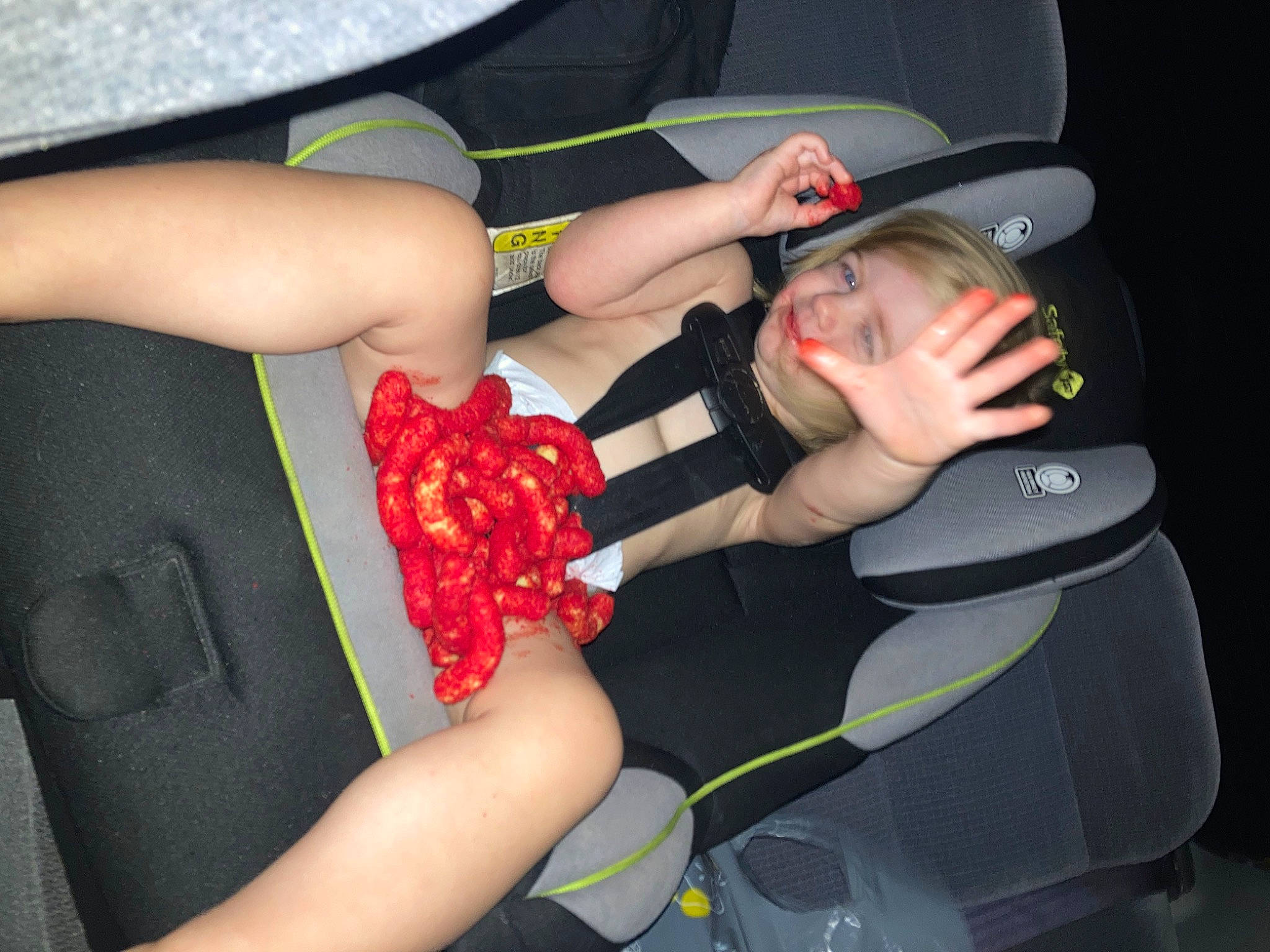 Haisley is registered to the contest to win money with this photo: arm, automotive_design, automotive_exterior, black_hair, car_seat, comfort, fashion, finger, gesture, hand, hat, human_body, joint, knee, nail, person, thigh, thumb, vehicle_door, waist