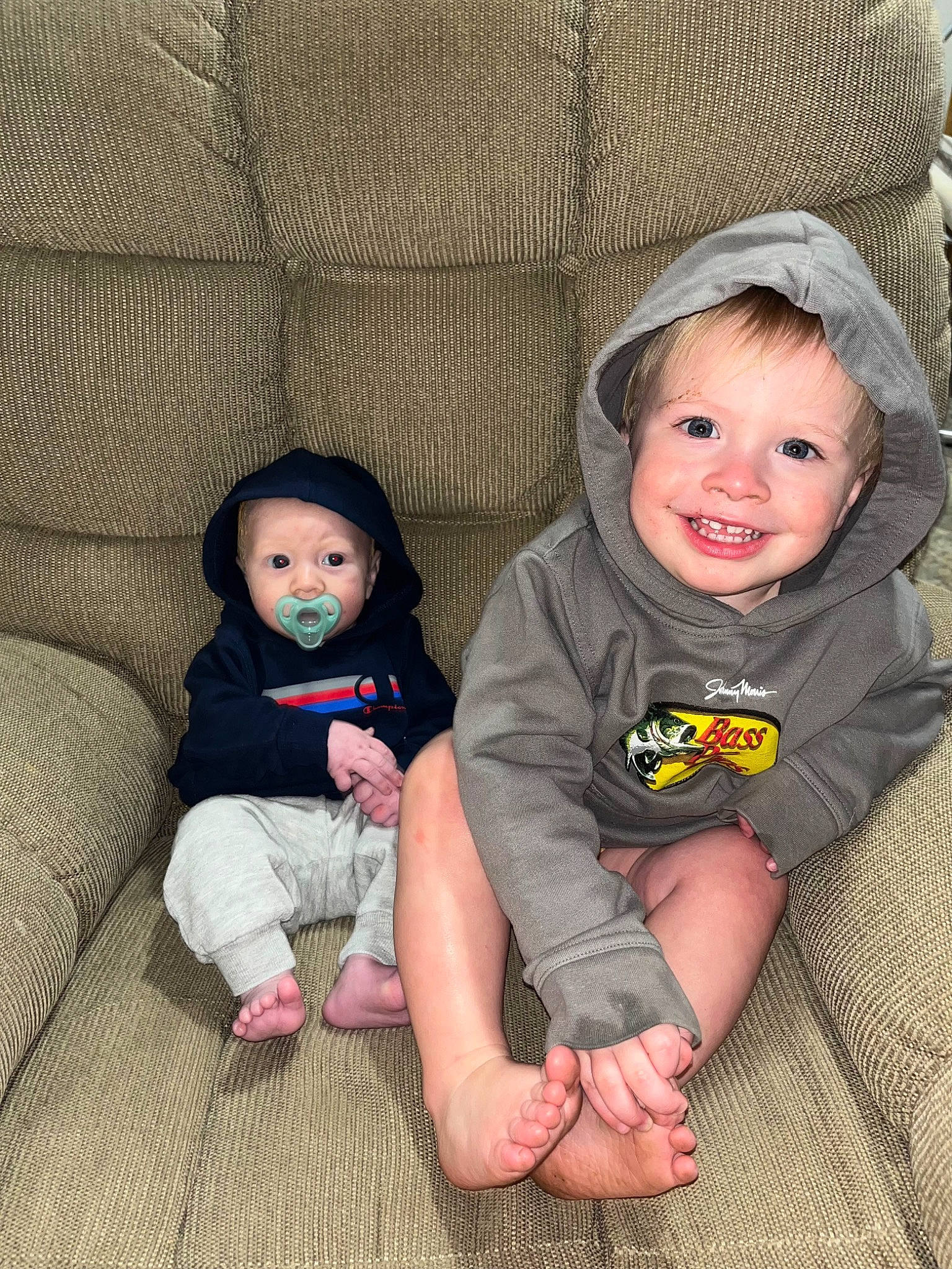 Christopher is registered to the contest to win money with this photo: baby, baby_toddler_clothing, cheek, chin, comfort, eye, face, grass, hairstyle, head, headgear, headwear, human_body, iris, joy, leg, mouth, nose, person, skin