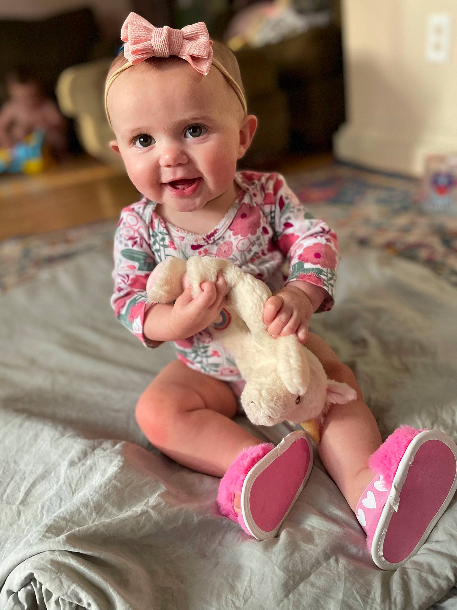 Chanel joined the competition — help win amazing prizes! baby, baby_toddler_clothing, cheek, child, dress, happy, head, human_body, knee, lap, leg, paper_towel, person, pink, skin, sleeve, smile, sock, textile, thigh