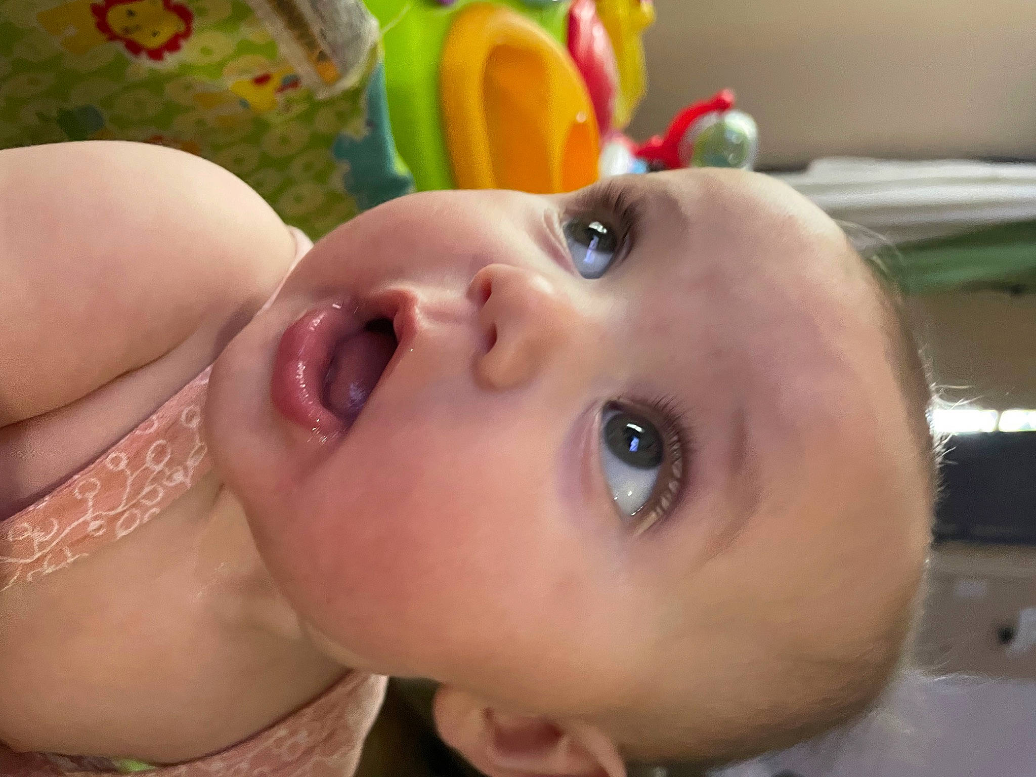 Chanel is registered to the contest to win money with this photo: baby, bathing, cheek, chest, child, close_up, eyelash, face, fun, happy, head, headgear, iris, lip, mouth, nose, person, skin, surprise, toddler