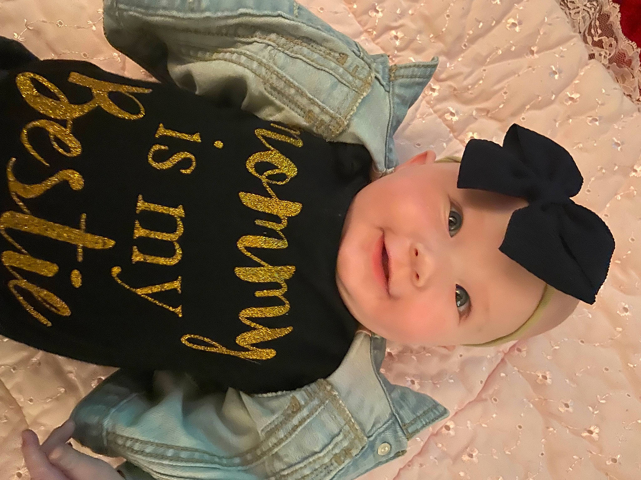 Tinzleigh is registered to the contest to win money with this photo: baby_toddler_clothing, cap, cheek, child, clothing, drink, fashion_accessory, font, happy, headgear, headwear, pattern, person, sleeve, smile, textile, toddler, white