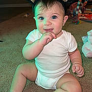 Alina joined the competition — help win amazing prizes! baby, child, cat_ears, headband, carpet, sitting, blue_eyes, white_onesie, sock, hand, toy, indoor, floor, cute, portrait, infant, playtime, face, expression, earrings