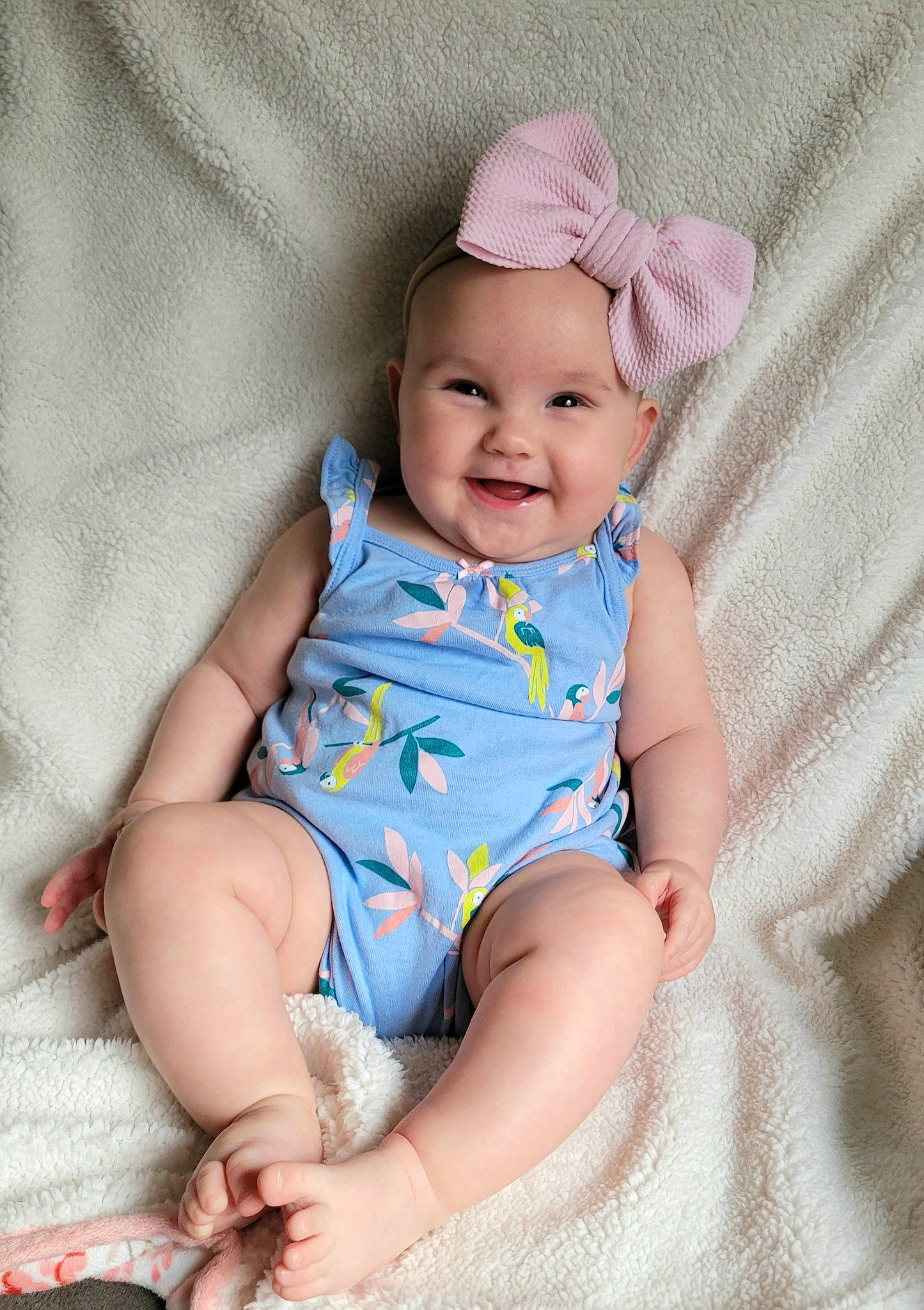 Madelyn joined the competition — help win amazing prizes! baby, baby_toddler_clothing, cap, child, comfort, costume_hat, eye, face, fashion_accessory, happy, head, headwear, joy, linens, pattern, person, pink, purple, skin, sleeve