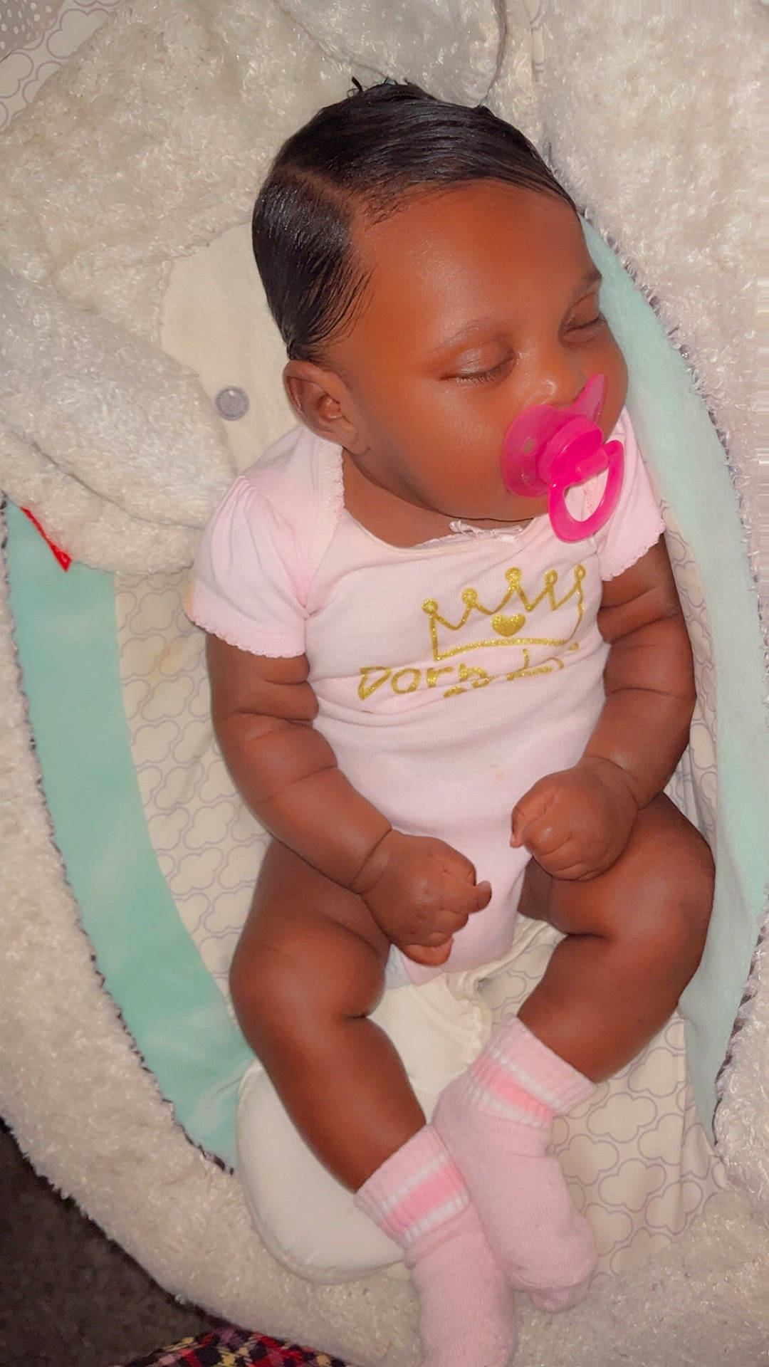 baby, baby_seat, child, cozy, cute, face, hands, head, indoors, infant, legs, newborn, onesie, pacifier, peaceful, pink, resting, sleeping, socks, soft_texture