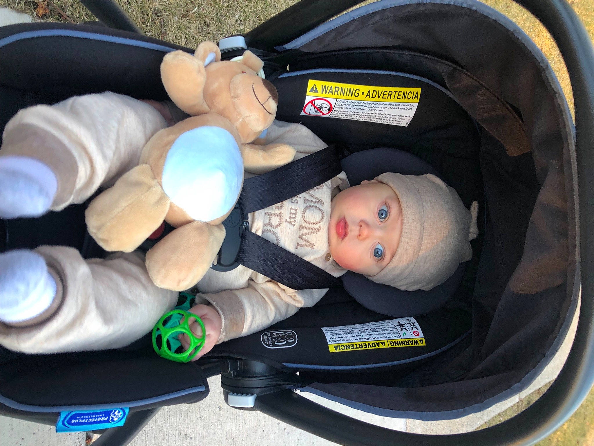 Phoenix is registered to the contest to win money with this photo: auto_part, automotive_design, automotive_exterior, automotive_tire, baby, baby_carriage, baby_products, car_seat, child, comfort, headwear, mode_of_transport, motor_vehicle, person, plastic, product, toddler, toy, vehicle_door, wheel