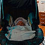 Ava joined the competition — help win amazing prizes! newborn, baby, car_seat, hospital, blanket, sleeping, infant, hat, bedroom, wooden_furniture, medical_equipment, person, indoors, resting, cozy, wrapped, child, small, cute, quiet