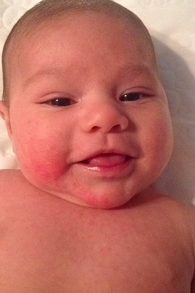 Hero is registered to the contest to win money with this photo: cheek, child, chin, close_up, ear, eyebrow, face, forehead, head, infant, jaw, lip, mouth, neck, nose, person, skin, smile