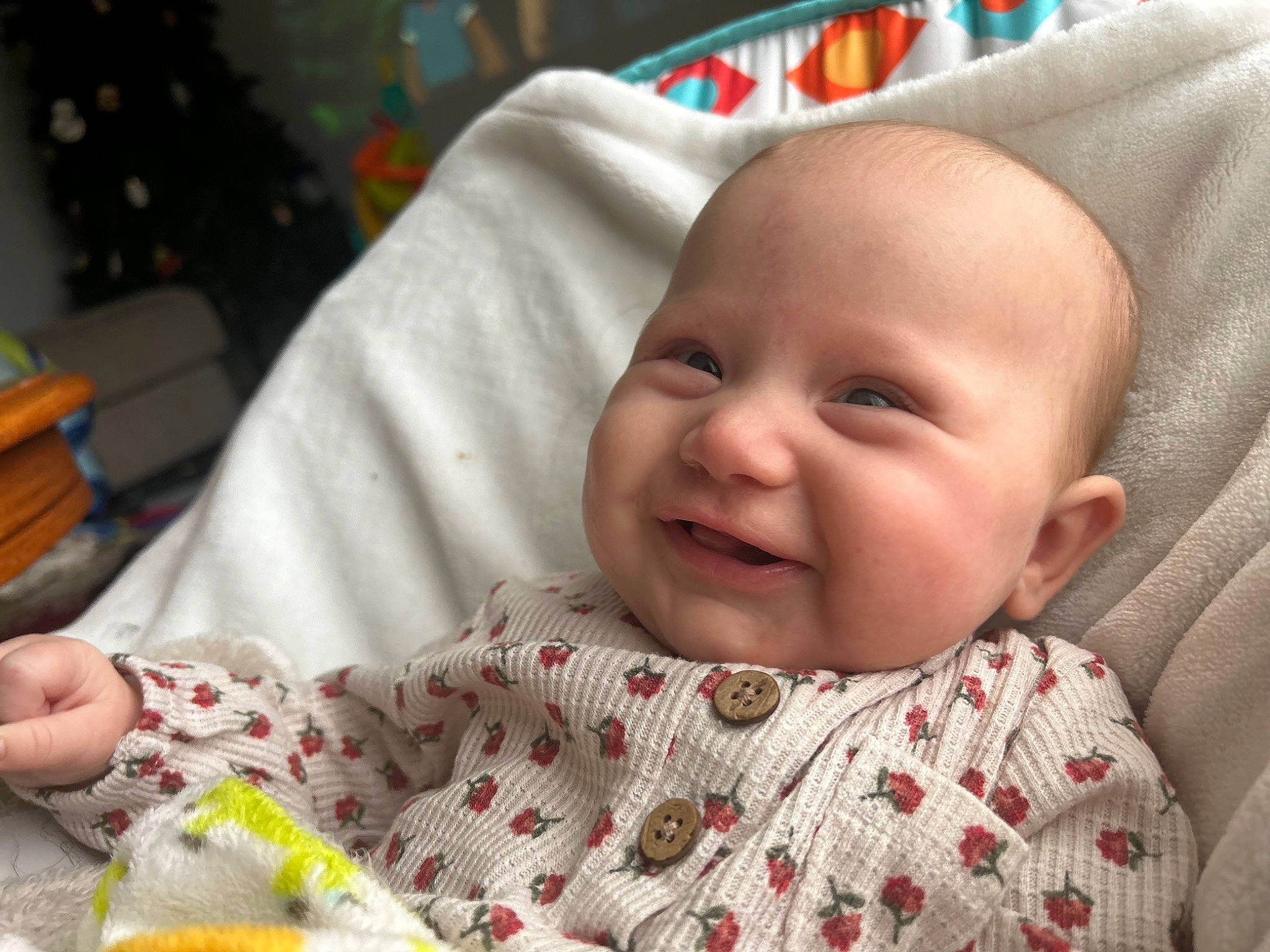 Anabella is registered to the contest to win money with this photo: baby, baby_products, baby_toddler_clothing, cheek, child, chin, comfort, facial_expression, happy, head, iris, joy, linens, nose, pattern, person, room, skin, sleeve, smile