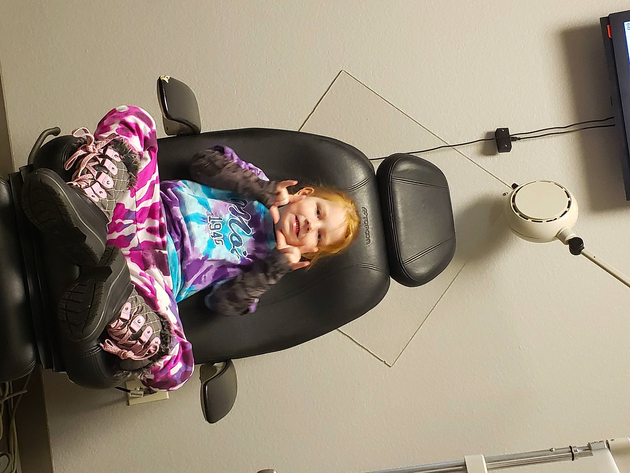 Peyton joined the competition — help win amazing prizes! audio_equipment, automotive_design, bag, cable, ceiling, comfort, eyewear, fashion_accessory, flooring, fun, joy, lamp, luggage_and_bags, machine, magenta, metal, person, room, sitting, smile