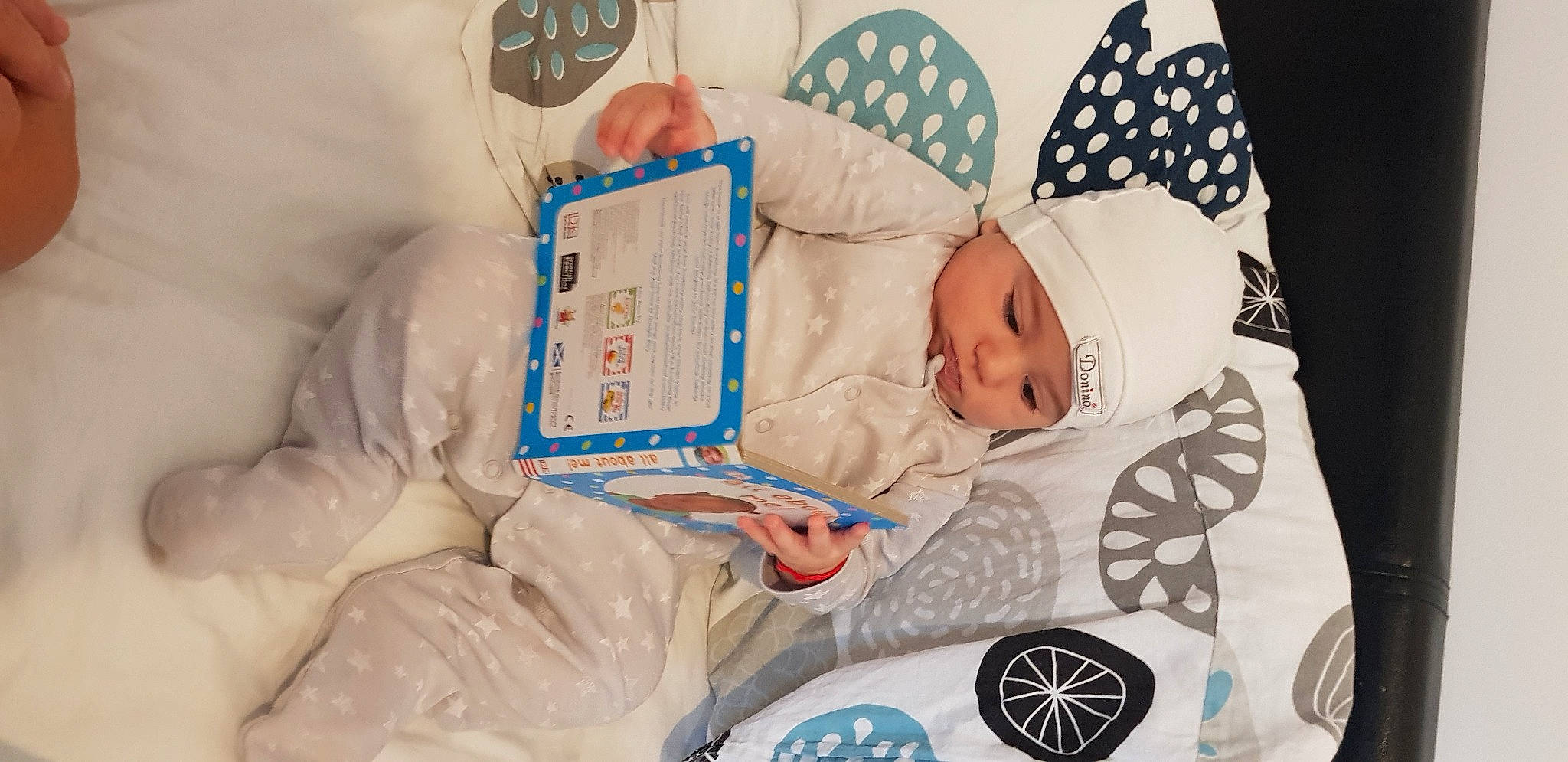 Aris is registered to the contest to win money with this photo: baby, baby_sleeping, bedtime, birth, blanket, child, comfort, headwear, nap, person, product, sleep, textile