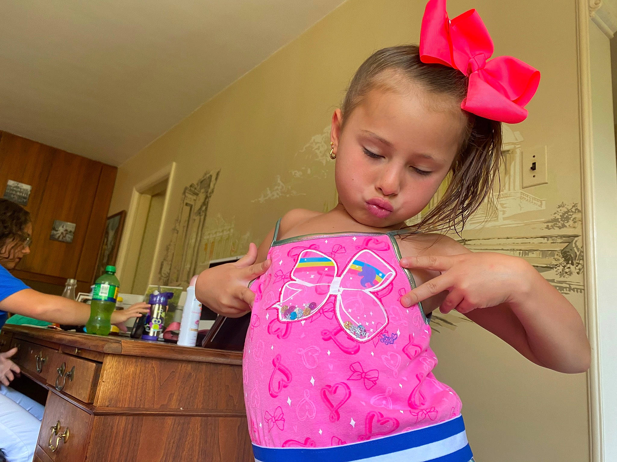 Kirsten is registered to the contest to win money with this photo: baby_toddler_clothing, birthday, child, costume, happy, party, party_hat, party_supply, person, pink, play, toddler