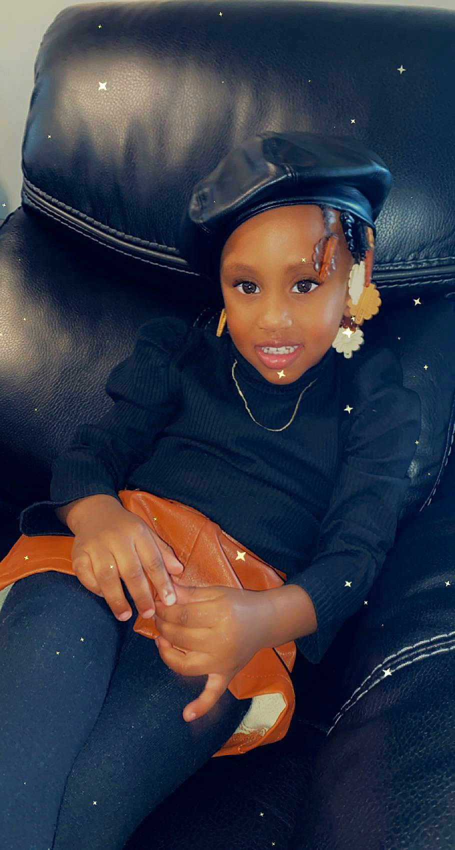 Layla is registered to the contest to win money with this photo: automotive_tire, baseball_cap, cap, clothing, cool, electric_blue, eye, flash_photography, gesture, hat, headgear, headwear, helmet, joy, outerwear, person, smile, sports_equipment, sports_gear, thigh