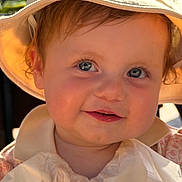 Alera is registered to the contest to win money with this photo: toddler, child, face, hat, smile, sunlight, bib, portrait, outdoor, baby, cute, happy, headwear, skin, young, person, clothing, closeup, expression, daylight