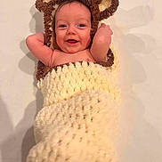 Christine Briggs joined the competition — help win amazing prizes! baby, infant, child, portrait, smiling, happy, face, eyes, indoors, blanket, plush, teddy_bear, animal_ears, costume, cozy, lying_down, nursery, soft_lighting, close_up, photography