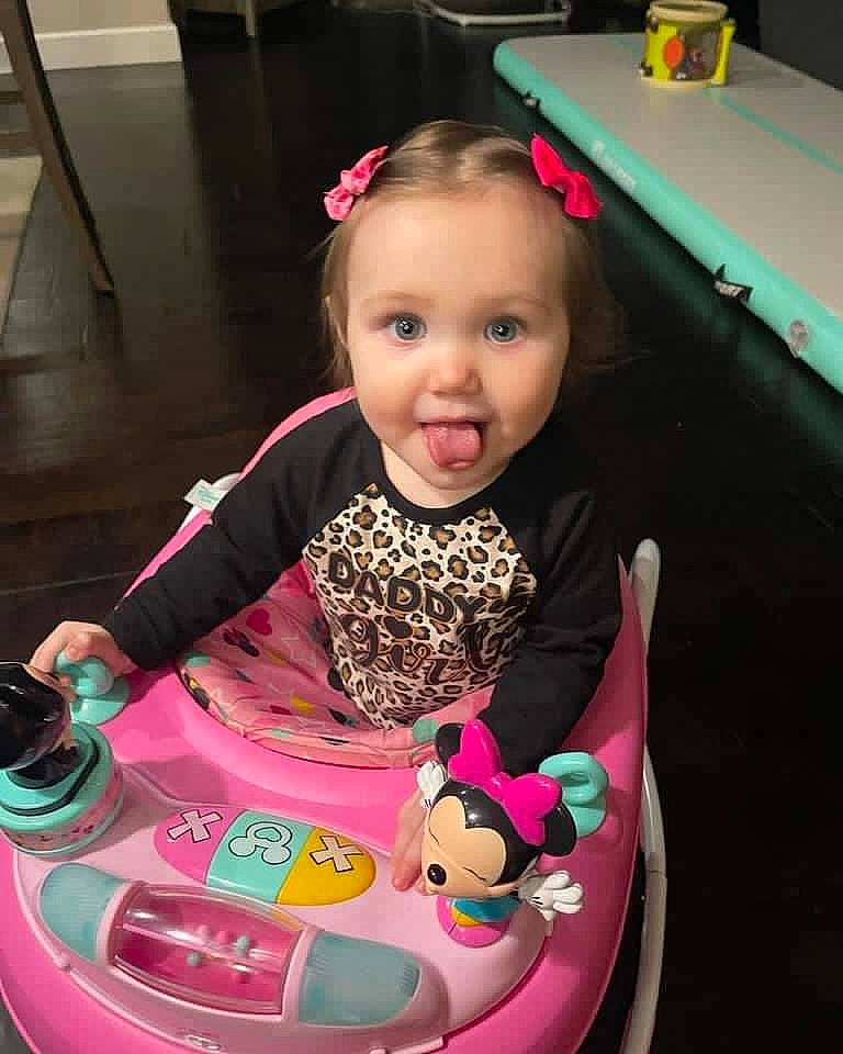 Novalynn joined the competition — help win amazing prizes! automotive_lighting, baby, baby_toddler_clothing, billiard_room, billiard_table, billiards, chair, cool, fun, happy, person, pink, pocket_billiards, recreation, riding_toy, smile, snapshot, straight_pool, surprise, t_shirt
