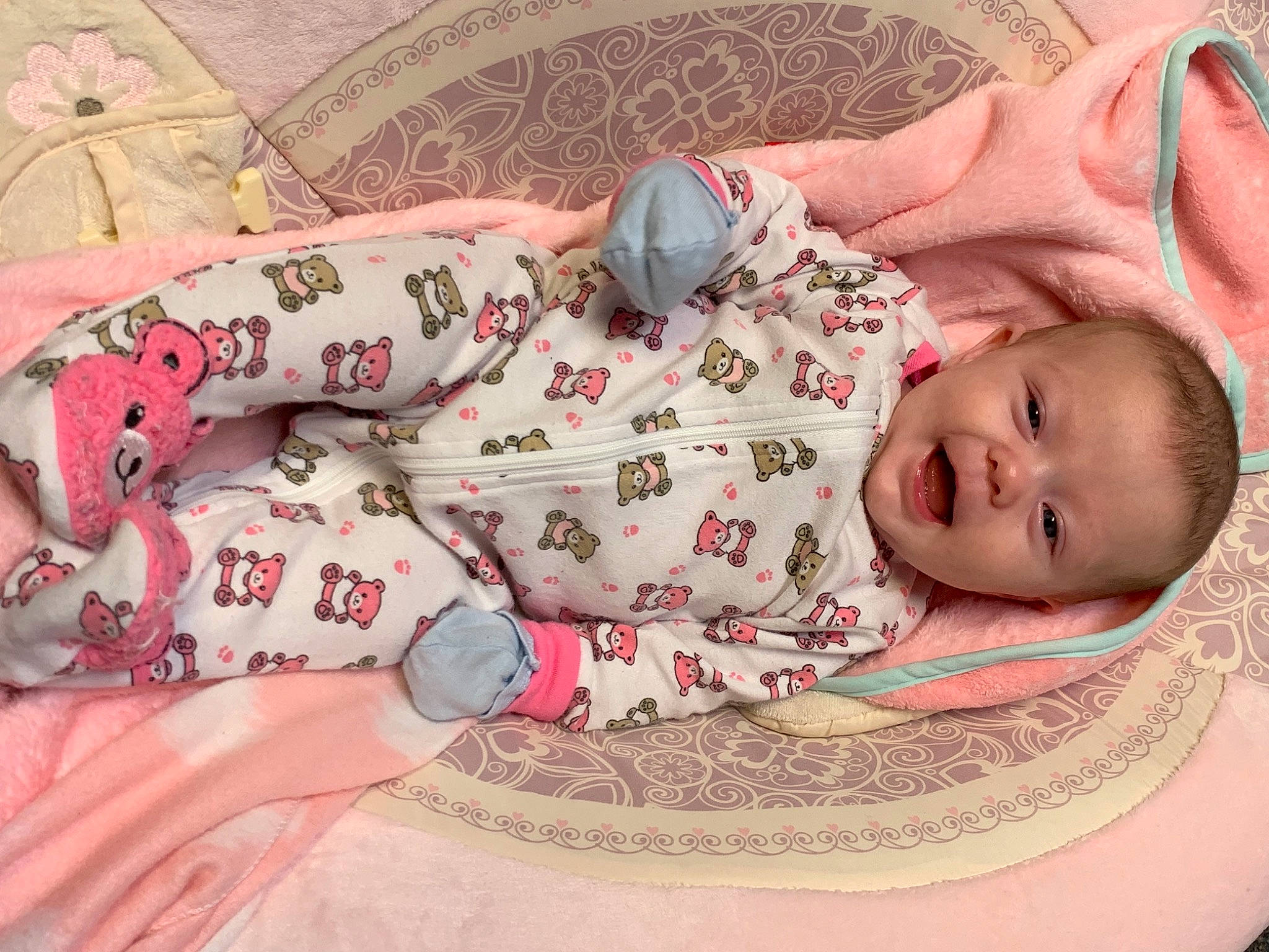 Annalee is registered to the contest to win money with this photo: baby, baby_products, baby_safety, baby_sleeping, baby_toddler_clothing, bedding, bedtime, child, comfort, flooring, linens, nightwear, pattern, person, pink, product, room, skin, sleeve, textile