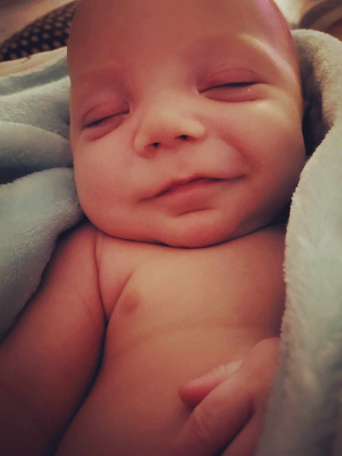 Kolter Xavier joined the competition — help win amazing prizes! baby, sleeping, smile, closeup, blanket, infant, skin, peaceful, soft, cute, child, newborn, hand, resting, wrapped, face, portrait, relaxed, comfort, toddler