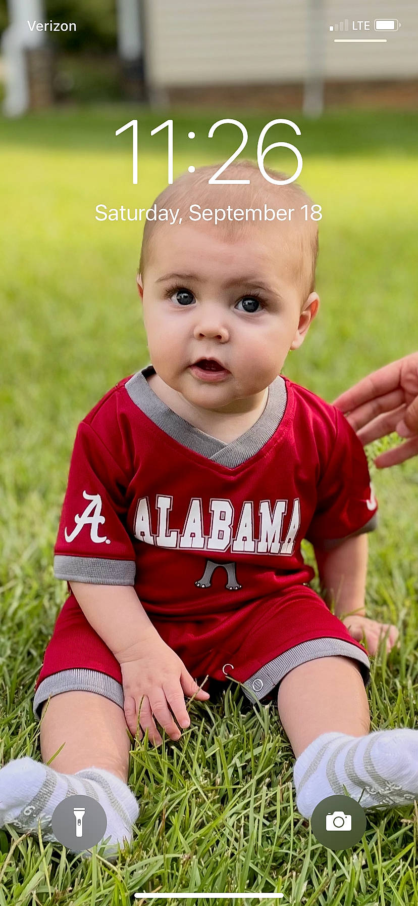 Hayes joined the competition — help win amazing prizes! baby, baby_toddler_clothing, child, eye, face, facial_expression, finger, grass, happy, head, human_body, leisure, people_in_nature, person, photograph, plant, red, skin, sleeve, standing