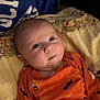 Kinsleigh joined the competition — help win amazing prizes! baby, infant, orange_clothing, bats, pumpkins, blanket, winnie_the_pooh, cute, face, eyes, chubby_cheeks, soft_light, indoor, person, portrait, lying_down, curious, child, young, cozy