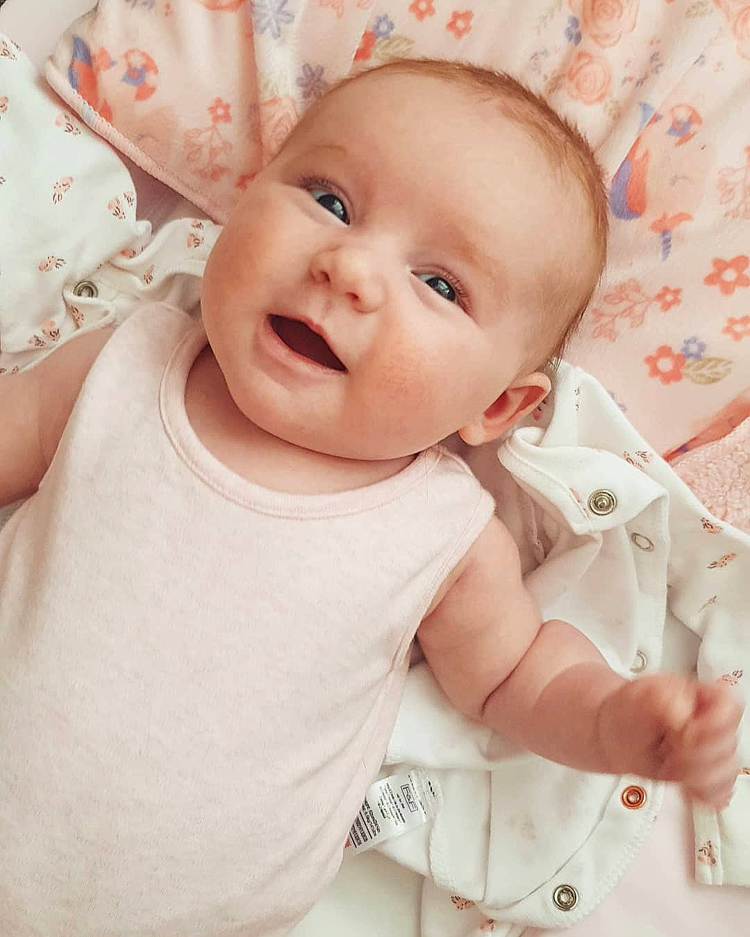 Billie is registered to the contest to win money with this photo: baby, baby_toddler_clothing, beauty, cheek, child, eye, face, lip, nose, person, pink, skin, sleeve, smile, toddler