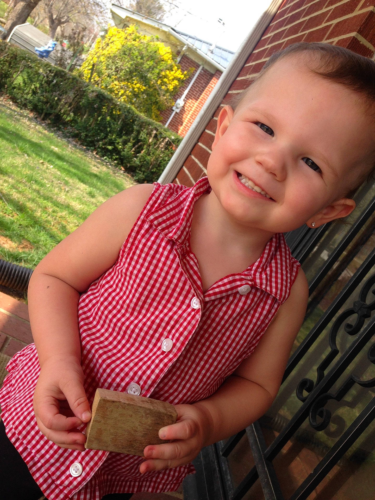 Brinleigh is registered to the contest to win money with this photo: child, girl, hand, human_action, human_positions, infant, interaction, joy, leg, model, person, photo_shoot, photography, sitting, toddler